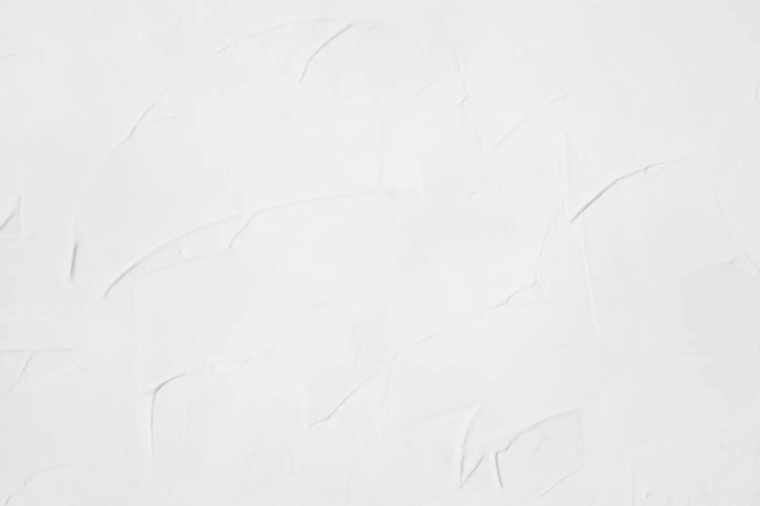 Faded and discolored interior paint on a white wall surface showing what causes interior paint to fade over time