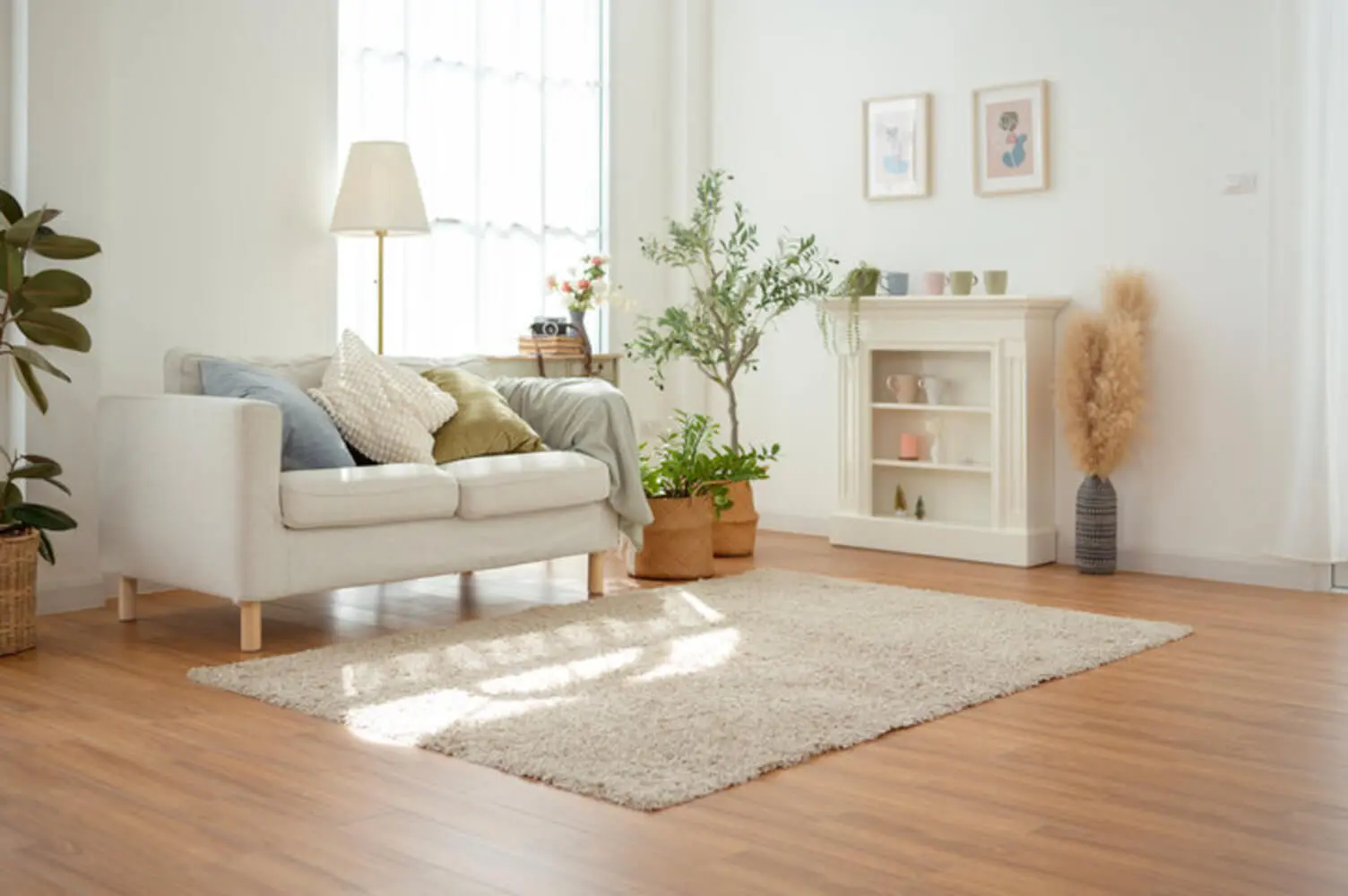 Bright living room with light-colored walls showing how natural light and interior paint color work together
